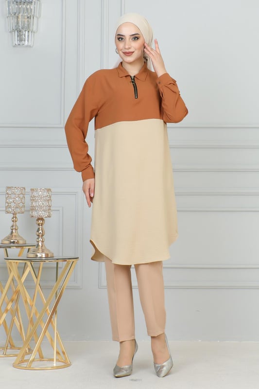 Stoffmerkmal: Hergestellt aus Belmando-Stoff.Produktmerkmal: Neues Hijab-Modemodell der Saison. Ungefüttert. Hat einen halben Reißverschluss vorne für einfache Verwendung. Manschettenknöpfe sind funktional. Aufgrund von Konzeptaufnahmen kann es leichte Farbabweichungen im Produkt geben. Das Model trägt Größe 40. Größe 38 Tunika-Maße: Produktlänge: 99 cm - Br