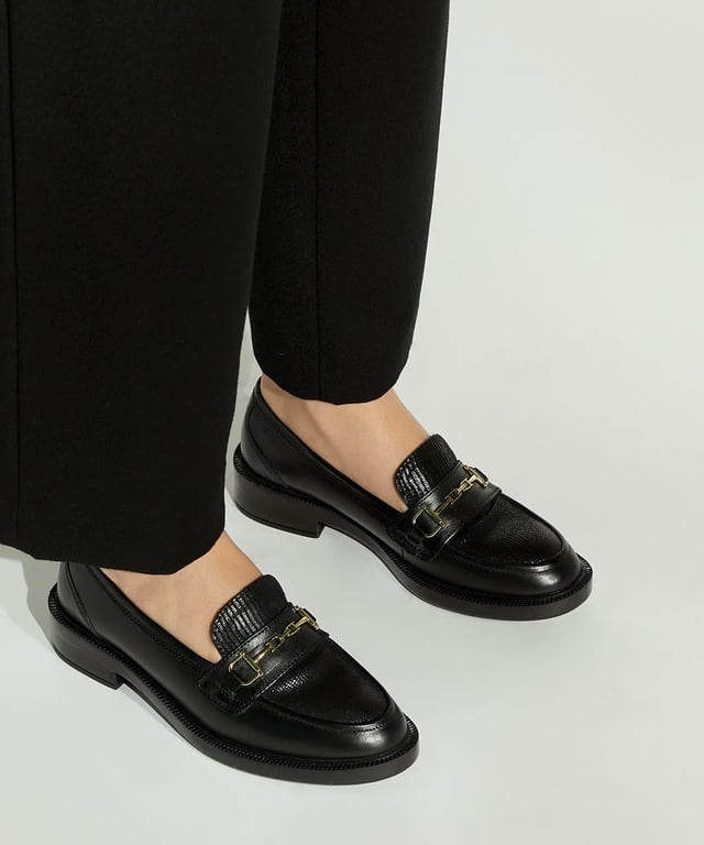 Dune Ladies GRID Leather Monogram-Snaffle Trim Loafers GRID This season's It style has been reworked with our covetable Grid loafers. These flats have been crafted in-house with smooth, premium leather and are designed with the clean silhouette that we all know and love. But this time, the metal-snaffle trim is accented with our bespoke Dune London monogram, making this the ideal way to update any woman's smart-casual shoe collection.
