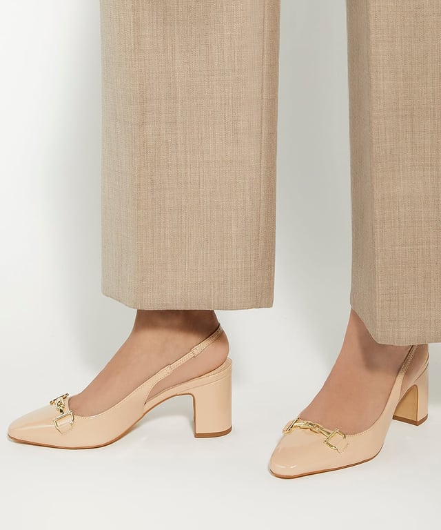 Dune Ladies Detailed - Snaffle-Trim Heeled Slingback Courts Our effortlessly elegant, timeless Detailed slingbacks are the perfect way to ease back into dressing up once again. Designed with various finishes, this almond-toed silhouette is the epitome of sophistication, enhanced with our bespoke 'mirror D'-snaffle trim. Set on a sturdy block heel for ease of wear and finished with an elasticated strap, this style is ideal for occasion wear and beyond.