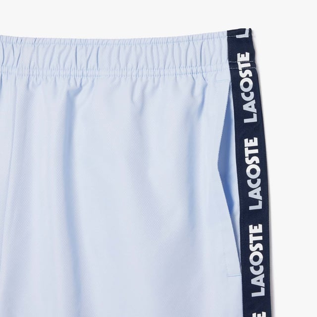 Mens Lacoste Sport Sportsuit Logo Stripe Tennis ShortsRecycled polyester made from manufacturing offcuts Regular fit  straight cut  Jersey lining Crease resistant Silicone crocodile on front