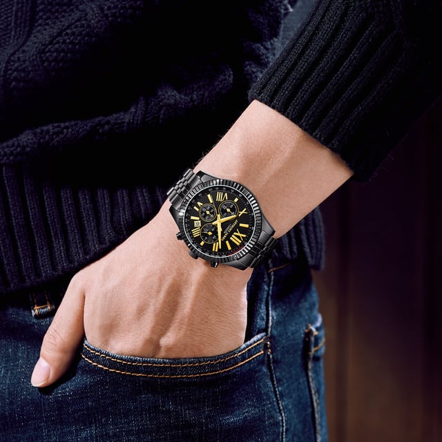Watch Specification
• Quartz Chronograph Movement
• Black Chrono Dial with Fluted Bezel
• Tachymeter
• Minutes, Hours & Seconds Sub Dials
• Water Resistant 3ATM
• Scratch Resistant Mineral Glass
• 5 Year Warranty

Sizes & Weights
• Case Diameter 43.5 mm 
• Case Thickness 10.8 mm
• Lug Width 20 mm
• Strap Width 18 mm
• Strap Length 220 mm
• Weight 96 Grams

Materials & Colour
• Steel & Alloy Case 
• Logo Engraved Stainless Steel Caseback
• Black IP Stainless Steel Bracelet  
• Folding Safety Clasp with Logo
• Logo Crown