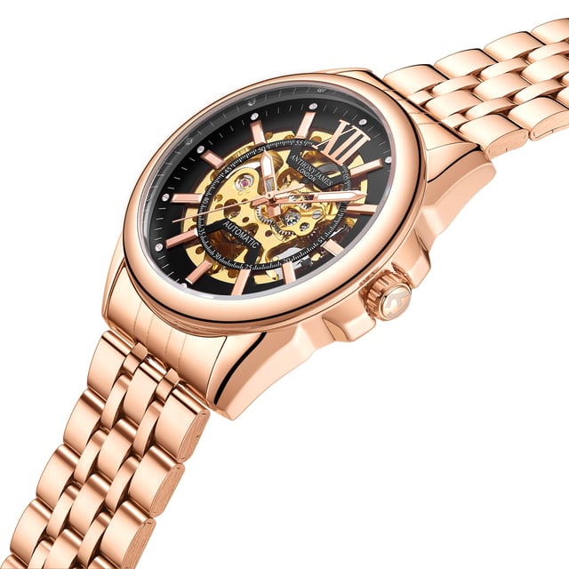 "Die Anthony James Hand Assembled Limited Edition Mystique Automatic Rose Herrenuhr verfügt über ein 21-Rubin-Uhrwerk mit 162 Teilen und eine hervorragende Präzision, die durch das skelettierte Goldzifferblatt hervorgehoben wird, das einen kühnen Kontrast zum schwarzen Rand bildet, und dieselbe Technik ist vom Gehäuseboden aus sichtbar. Die Uhr ist wasserdicht bis 3ATM und das kratzfeste Mineralglas ist anspruchsvoll und zuverlässig zugleich. Das rosafarbene Edelstahlarmband fixiert die Uhr, die mit einer fünfjährigen Garantie ausgestattet ist. " "Eigenschaften der Uhr - Automatikwerk - Handgefertigtes 162-teiliges Uhrwerk mit 21 Rubinen - Skelettiertes schwarzes und goldenes Zifferblatt - Wasserdicht 3ATM - Kratzfestes Mineralglas - 5 Jahre Garantie Maße und Gewichte - Gehäusedurchmesser 42 mm -. Dicke des Gehäuses 14 mm - Breite der Hörner 22 mm - Breite des Armbands 20 mm - Länge des Armbands 220 mm - Gewicht 123 Gramm Materialien und Farben - Stahl und Bo&amp;tier-Legierung - Skelettboden - Rosafarbenes Edelstahlarmband - Sicherheitsfaltschließe mit Logo - Krone mit Logo".