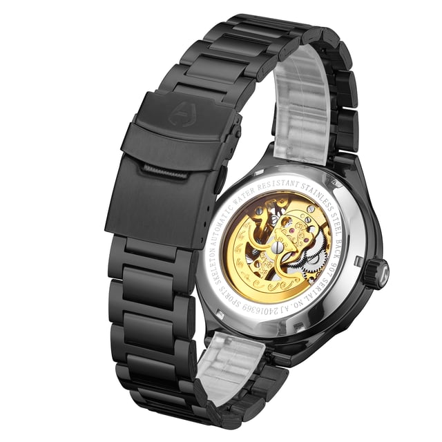 The Hand Assembled Anthony James Limited Edition Sports Skeleton Black men’s watch uses 162 part 21 jewel hand assembled movement that operates within the onyx Black IP geometric bezel secured by a Black IP bracelet. Its Skeleton Dial offers unique insight into the watch’s operation, while the scratch resistant mineral glass provides clarity. It boasts a 3ATM water resistance rating, and the Exhibition caseback completes the timepiece, which comes with a 5 year warranty.

Watch Specification
• Automatic Movement
• Hand Assembled 162 Part 21 Jewel Movement
• Black IP Geometric Bezel with Skeleton Dial
• Water Resistant 3ATM
• Scratch Resistant Mineral Glass
• 5 Year Warranty

Sizes & Weights
• Case Diameter 42 mm 
• Case Thickness 13.5 mm
• Lug Width 20 mm
• Strap Width 18 mm
• Strap Length 220 mm
• Weight 108 Grams

Materials & Colour
• Steel & Alloy Case 
• Skeleton Caseback
• Black IP Stainless Steel Bracelet
• Folding Safety Clasp with Logo
• Logo Crown