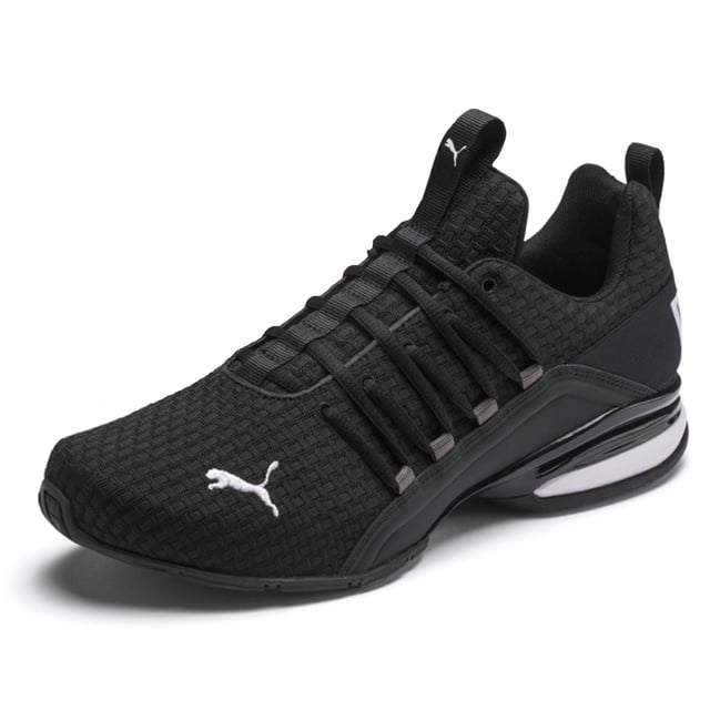 PRODUCT STORY Be bold in the game-changing silhouette of our Axelion Block Running Shoes, which combine contemporary design with the supreme comfort of our foam heel unit for the last word in athletic style. DETAILS   Low boot   Textile upper   Foam heel   TPU shank   Rubber outsole   PUMA Cat Logo at toe