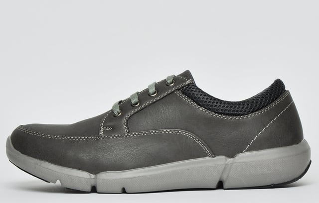 Possibly one of the most comfortable shoes you will ever put on your feet! The Caravelle Tyler is presented in a casual silhouette in an urban inspired colourway which is the ideal choice for stylish individuals who take their footwear seriously. <p>The Tyler also boasts a padded ankle collar for premium long-lasting comfort and a soft touch EVA insole which guarantees extra comfy fatigue-free wear, this shoe is a must have this season. </p> <p>- Soft-touch synthetic fused with textile upper </p> <p>- Ultralite construction like walking on air </p> <p>- Secure up-front lacing system </p> <p>- Intricate stitch detailing delivers a designer finish </p> <p>- Hard wearing and highly durable outsole </p>
