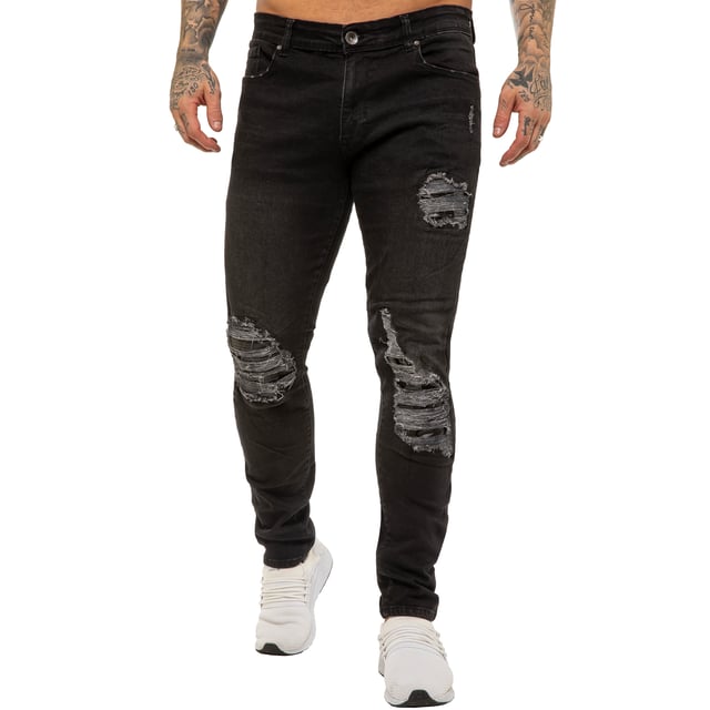 Estos pantalones vaqueros ajustados Enzo de denim elástico rasgados cuentan con un cierre de cremallera, son de fácil cuidado y cómodos de llevar. Con dos bolsillos frontales, dos bolsillos traseros y un bolsillo para monedas.