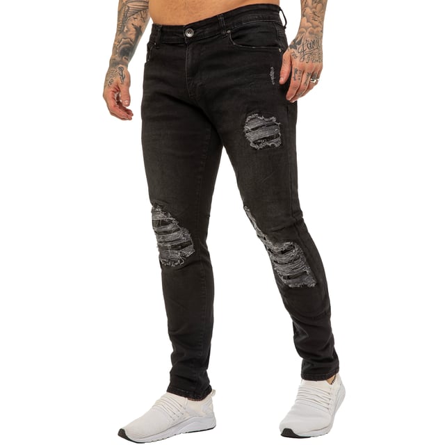 Estos pantalones vaqueros ajustados Enzo de denim elástico rasgados cuentan con un cierre de cremallera, son de fácil cuidado y cómodos de llevar. Con dos bolsillos frontales, dos bolsillos traseros y un bolsillo para monedas.