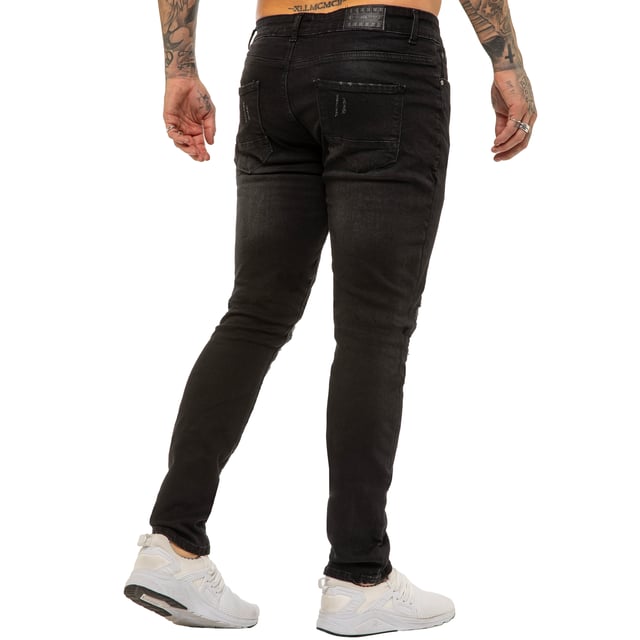 Estos pantalones vaqueros ajustados Enzo de denim elástico rasgados cuentan con un cierre de cremallera, son de fácil cuidado y cómodos de llevar. Con dos bolsillos frontales, dos bolsillos traseros y un bolsillo para monedas.