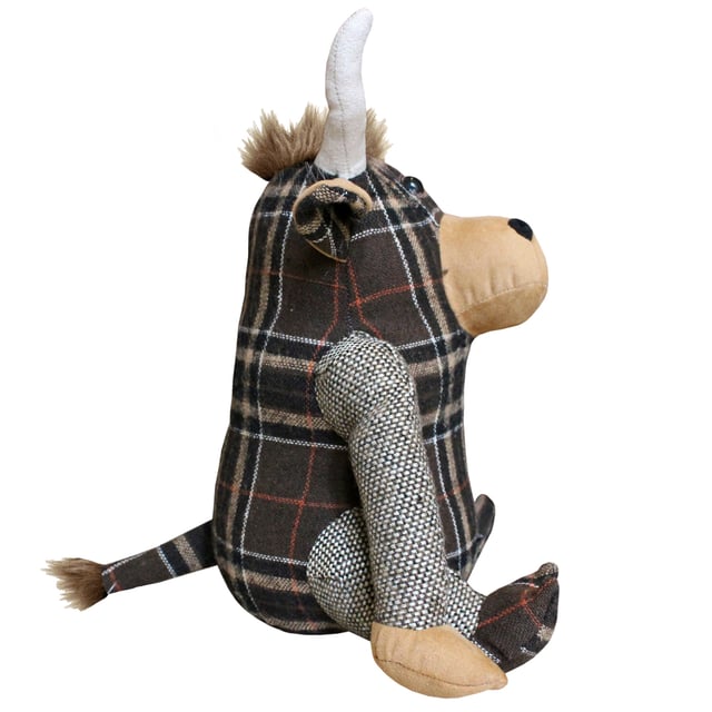 Alastair the Highland Cow is a novelty doorstop. Alastair is a plethora of patterns including a tartan body, feet and inner ears, plain outer ears, snout and hands. Complete with a cute tuft of hair on his head ad on the tip of his tail. Made of 100% polyester with a base filled with sand making Alastair heavy enough to hold open most doors. Alastair is spot clean only.