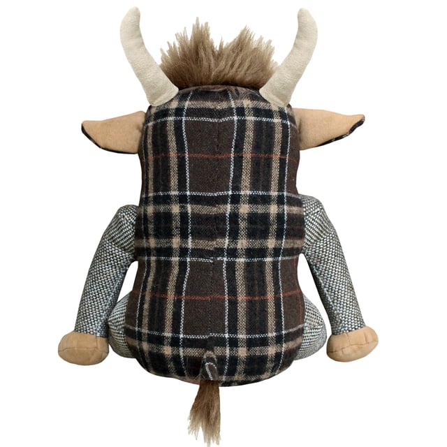 Alastair the Highland Cow is a novelty doorstop. Alastair is a plethora of patterns including a tartan body, feet and inner ears, plain outer ears, snout and hands. Complete with a cute tuft of hair on his head ad on the tip of his tail. Made of 100% polyester with a base filled with sand making Alastair heavy enough to hold open most doors. Alastair is spot clean only.
