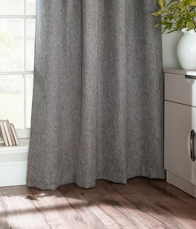 Add a cosy yet contemporary look to your décor with this modern and classic curtain set, which features a subtle herringbone weave. Made with a luxurious lightweight wool-like woven fabric holds outstanding durability and wrinkle resistance as well as having strong rustic colours that will compliment any interior. These curtains are perfect to keep your home warm in winter and cool in summer.