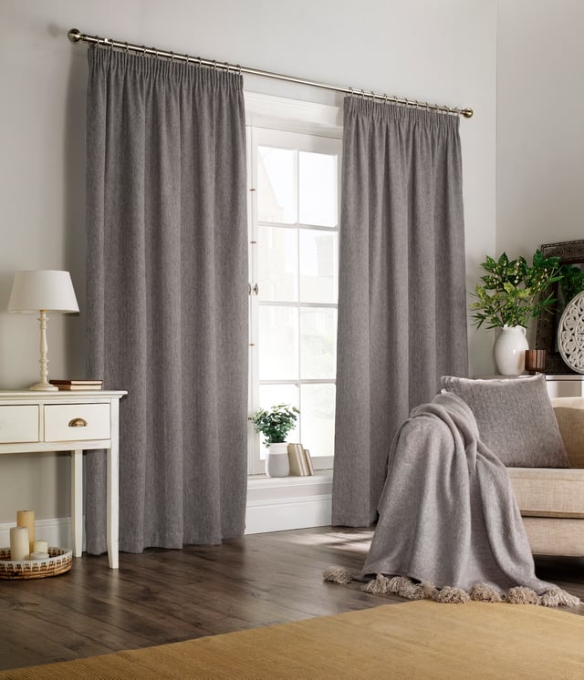 Add a cosy yet contemporary look to your décor with this modern and classic curtain set, which features a subtle herringbone weave. Made with a luxurious lightweight wool-like woven fabric holds outstanding durability and wrinkle resistance as well as having strong rustic colours that will compliment any interior. These curtains are perfect to keep your home warm in winter and cool in summer.