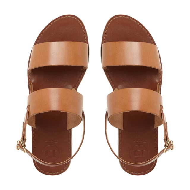 The Dune London Lowpez sandal is a stylish summer style. It works a double strap design with a slingback and buckle fastening. The flat sole and understated gold-toned Dune brand completes this design.