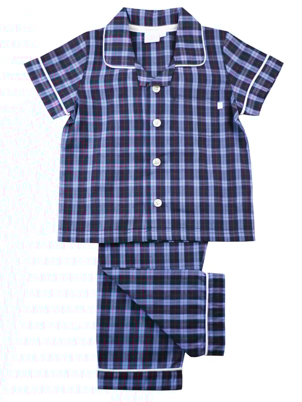 There’s no such thing as a basic check at Mini Vanilla! In our Short sleeve crisp summer cotton boys pyjamas we’ve blended navy with blue and red to create a  traditional look that’s perfect for lounging or sleeping. Made from super-soft 100% crisp cotton. The set is trimmed with white cotton piping. The top has an open collar and revere, single square pocket with MV tab and fastens with Mini Vanilla Engraved buttons. The crisp cotton comfy trousers have a fully soft elasticated waist and white piping at the hem to finish this very traditional boys pyjamas