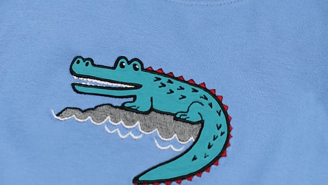 Our crocodile is guaranteed not to snap - it only smiles! Our shortie cotton pyjamas set brings some fun to bedtimes! Made from 100% super soft cotton. The soft jersey mid blue top, with the crocodile embroidery / applique has a matching rib neck, so easy to put on and off. The shorts have a fully soft elasticated waist and are made in a crisp summer cotton check.  We are sure these will be a firm favourite this summer!