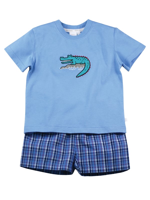Our crocodile is guaranteed not to snap - it only smiles! Our shortie cotton pyjamas set brings some fun to bedtimes! Made from 100% super soft cotton. The soft jersey mid blue top, with the crocodile embroidery / applique has a matching rib neck, so easy to put on and off. The shorts have a fully soft elasticated waist and are made in a crisp summer cotton check.  We are sure these will be a firm favourite this summer!