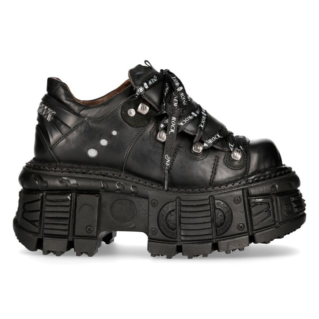 Este estilo de botines de cuero se ha convertido en sinónimo del nombre New Rock y de toda la calidad y el estilo por los que es aclamado internacionalmente. La icónica marca New Rock brilla en esta pieza, con el nombre de la marca que aparece de forma destacada en texto blanco en los cordones y una insignia de New Rock adornada en el talón. Para un toque atrevido y contemporáneo, el talón y la suela se elevan a una altura de 6 cm y 4 cm respectivamente, lo que le da a estas botas una autoridad destacada que da como resultado una presencia llamativa. Un orgulloso miembro de la colección metálica, esta es una gran pieza elegante que se lleva cómodamente y exuda un estilo rebelde y elegante. • Altura del tacón: 6 cm• Altura de la plataforma: 4 cm• Altura de la caña: 11 cm• Cordones negros con la marca en blanco• Material de la suela: PU• Material exterior: piel de vacuno