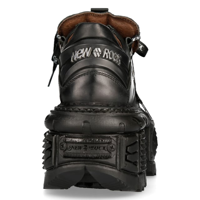Este estilo de botines de cuero se ha convertido en sinónimo del nombre New Rock y de toda la calidad y el estilo por los que es aclamado internacionalmente. La icónica marca New Rock brilla en esta pieza, con el nombre de la marca que aparece de forma destacada en texto blanco en los cordones y una insignia de New Rock adornada en el talón. Para un toque atrevido y contemporáneo, el talón y la suela se elevan a una altura de 6 cm y 4 cm respectivamente, lo que le da a estas botas una autoridad destacada que da como resultado una presencia llamativa. Un orgulloso miembro de la colección metálica, esta es una gran pieza elegante que se lleva cómodamente y exuda un estilo rebelde y elegante. • Altura del tacón: 6 cm• Altura de la plataforma: 4 cm• Altura de la caña: 11 cm• Cordones negros con la marca en blanco• Material de la suela: PU• Material exterior: piel de vacuno