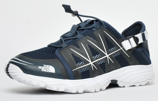 These North Face Litewave Amphibious shoes are designed to withstand the demands of hiking in wet environments <p>Constructed from a non-wicking synthetic and airmesh upper with a collapsible and adjustable heel counter this shoe is a reliable partner for your favourite outdoor adventures. </p> <p>A moulded EVA Northotic footbed cushions your feet across rocky riverbeds and other tough terrains, while the high-abrasion UltrATAC rubber outsole provides maximum grip on wet and slippery surfaces.</p> <p>- Textile mesh and synthetic mix upper</p> <p>- Personalised bungee lace system</p> <p>- Collapsible and adjustable heel counter </p> <p>- Moulded EVA Northotic footbed-</p> <p>- UltrATAC rubber outsole</p> <p>- North Face branding</p>