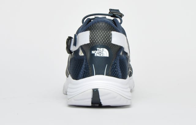 These North Face Litewave Amphibious shoes are designed to withstand the demands of hiking in wet environments <p>Constructed from a non-wicking synthetic and airmesh upper with a collapsible and adjustable heel counter this shoe is a reliable partner for your favourite outdoor adventures. </p> <p>A moulded EVA Northotic footbed cushions your feet across rocky riverbeds and other tough terrains, while the high-abrasion UltrATAC rubber outsole provides maximum grip on wet and slippery surfaces.</p> <p>- Textile mesh and synthetic mix upper</p> <p>- Personalised bungee lace system</p> <p>- Collapsible and adjustable heel counter </p> <p>- Moulded EVA Northotic footbed-</p> <p>- UltrATAC rubber outsole</p> <p>- North Face branding</p>