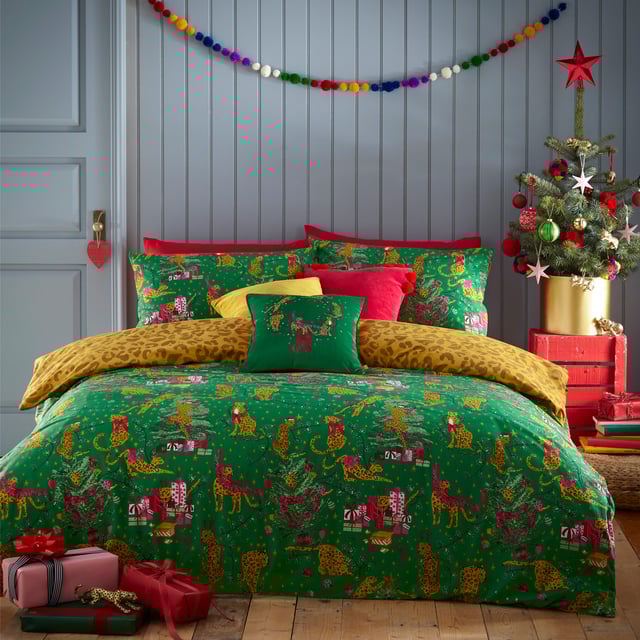 Bring some playful festive cheer to your bedroom this holiday season, with the Purrfect Christmas Duvet Cover Set. Featuring Leopards getting into mischief wrapped in tinsel, and opening presents under the tree. This bold print is complete with a tonal leopard print reverse, giving you two looks in one!