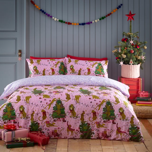 Bring some playful festive cheer to your bedroom this holiday season, with the Purrfect Christmas Duvet Cover Set. Featuring Leopards getting into mischief wrapped in tinsel, and opening presents under the tree. This bold print is complete with a tonal leopard print reverse, giving you two looks in one!