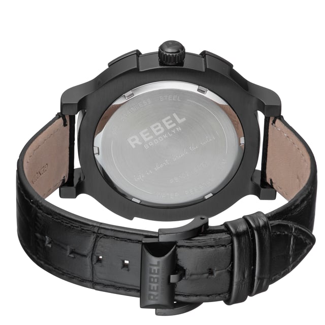 “   Life is short, Break the rules!”           This line, which is quoted on the caseback of the watch, is the essence of the Brooklyn Bridge collection. Go for a walk on the Brooklyn Bridge for a great view or you can wear the great view on your wrist and break trends every day.
Rebel Brooklyn Bridge Black Dial Men's Watch RB102-6071
Rebel Men's Watch from the Brooklyn Bridge Collection
Round 316L Stainless Steel Black Case
Black Dial, Mineral Crystal w/ Sapphire Coating
Black Leather Band with Tang Buckle
Water Resistance: 5 ATM (50 meters, 165 feet)
12mm Case Thickness, 48mm Case Diameter, 22mm Band Width
Quartz Movement