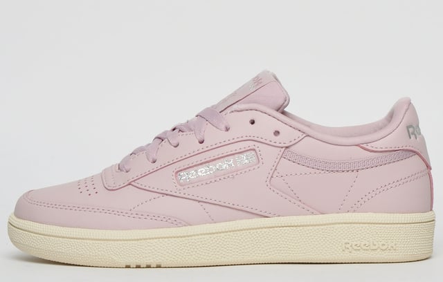 These Reebok Classic Club C85 womens trainers are the perfect example why the court shoe will never go out of style. The versatility of this clean iconic classic makes them perfect to wear on any occasion. Featuring a soft leather upper, a die-cut EVA midsole and padded foam sock liner, the Reebok Classic Club C 85 boasts sumptuous comfort, a snug fit and fatigue-free wear throughout the day. <p>- Soft leather upper synthetic for full foot comfort </p> <p>- Padded foam sock liner for sumptuous wear </p> <p>- Low-cut design for quicker foot transitions </p> <p>- Die-cut EVA midsole for a lightweight layer that absorbs impact </p> <p>- High abrasion outsole </p> <p>- Reebok Classic branding throughout</p>