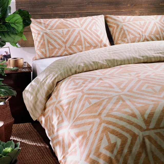 A soft, global-inspired geometric print duvet set and pillow cases - perfect for adding texture and warmth to your bedroom. Featuring a tonal animal print reverse print, for a softer alternative when you need it.
