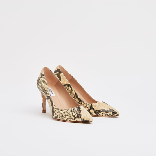 Our Floret courts are sleek and stylish. Crafted in Spain from snake print yellow leather, this L.K.Bennett signature style has a pointed toe, single sole and a slender, 85mm stiletto heel. Perfect day or night, wear Floret with shift dresses or tailored trousers in the office and with something softer and lighter for the evenings and summer occasions.