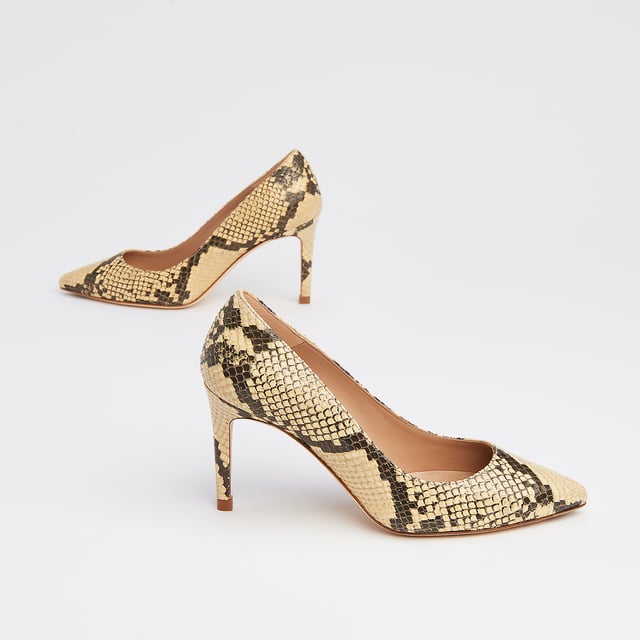 Our Floret courts are sleek and stylish. Crafted in Spain from snake print yellow leather, this L.K.Bennett signature style has a pointed toe, single sole and a slender, 85mm stiletto heel. Perfect day or night, wear Floret with shift dresses or tailored trousers in the office and with something softer and lighter for the evenings and summer occasions.