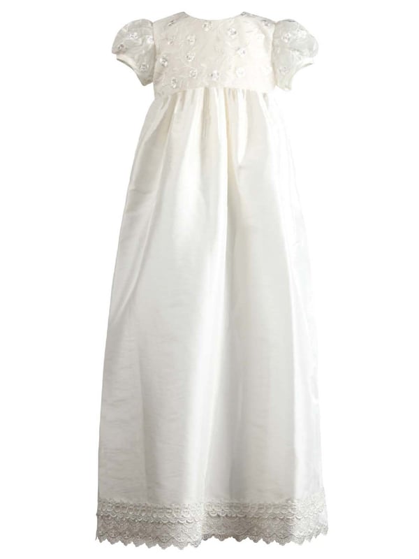 Could the Heritage Nessa Traditional style long Christening Robe, be your next family Heirloom!
This beautiful Christening dress has a lace bodice and short sleeves. Around the hem is a beautiful a lace trim.
We've added a concealed back zip fastening so you can't see it - also making it easy to get on and off.
As part of the outfit it comes with a matching cotton lined bonnet.
You could team it up with one of our bolero cardigans in case of our unpredicatable UK weather :(
We also have some lace knickers in a matching fabric that keep nappies covered and looking good. Look for style XENA in our Accessories section
Both items are lined in 100% lightweight soft cotton making it feel so soft against your baby's skin and good for any little ones with sensitive skin.
The dress comes on a satin ribboned padded hanger and protected in a Heritage garment over bag.
Outer - 100% polyester - mock silk
Lining - 100% Cotton
Hand wash or Dry Clean only.