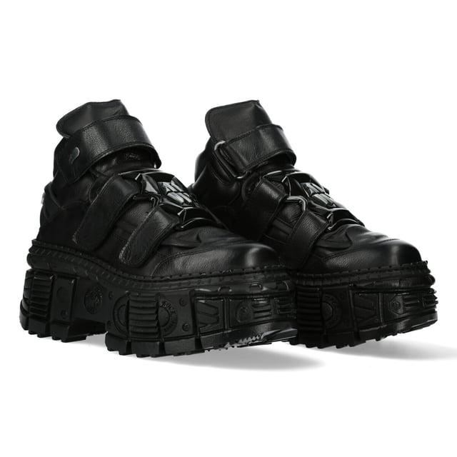 The Iconic Boot WALL285-S2 is from the ever so popular Wall collection, Constructed from the finest hide leather combined with a durable rubber sole. These boots feature Lace-up fastening, cushioned insole, leather lining and embodies the quality, style and comfort that you have come to expect from New Rock Boots.These stylish unisex boots have a 10cm gum rubber heel to give you a towering presence that is sure to turn heads. The fit is superb, sleek and sexy as pictured. Why not buy some thing unique, versatile, stylish and different.  Heel Height - 10cm Platform Height - 8cm Shaft Height - 10cm Sole Material - Natural Rubber Outer Material - Cow Hide Leather