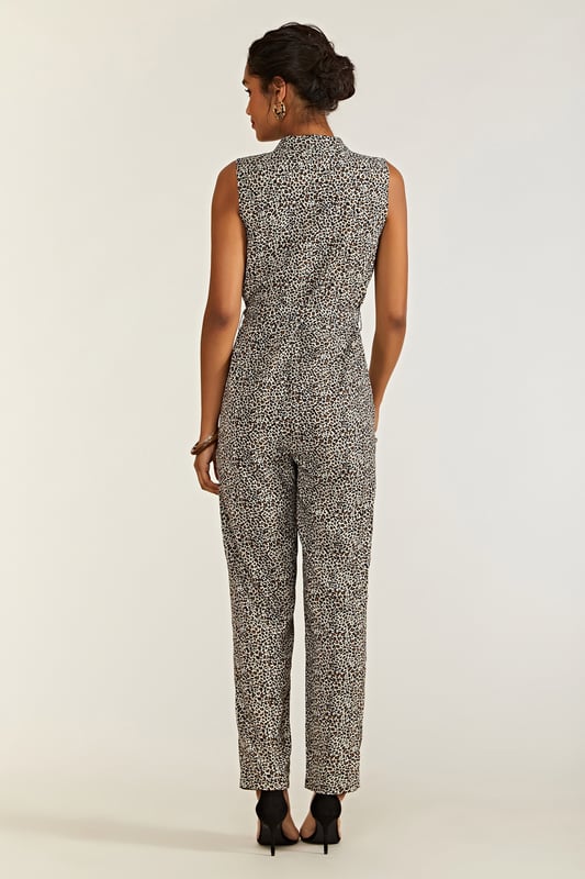 Meet the perfect one-piece: our Leopard Print Jumpsuit. On-trend and with a fierce twist, this sleeveless jumpsuit is cut from lightweight and smooth polyester. The semi-fitted cut allows the fabric to gather at the waist, secure with a tie and drape from the hips down. With pockets adding practicality, the animal print design is something to go wild for. 95% Polyester 5% Elastane. Machine Wash At 30. Length is 148cm/58inches.
