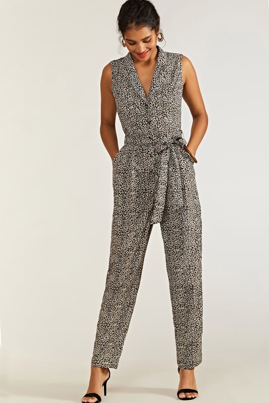 Meet the perfect one-piece: our Leopard Print Jumpsuit. On-trend and with a fierce twist, this sleeveless jumpsuit is cut from lightweight and smooth polyester. The semi-fitted cut allows the fabric to gather at the waist, secure with a tie and drape from the hips down. With pockets adding practicality, the animal print design is something to go wild for. 95% Polyester 5% Elastane. Machine Wash At 30. Length is 148cm/58inches.