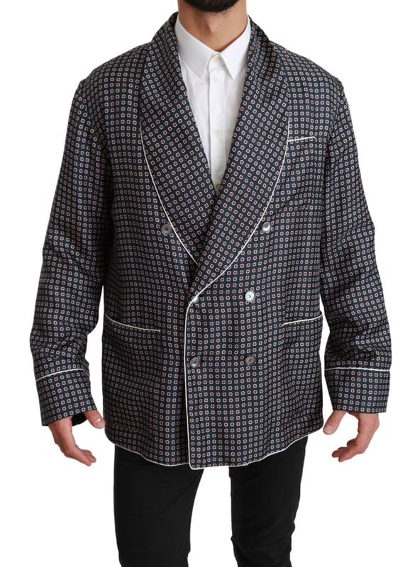 Merk: Dolce & Gabbana
  Stijl: jas met dubbele rij knopen
  Kleur: Marineblauw met patroon
  Sluiting: Knoop
  Pasvorm: Normale pasvorm
  Drie buitenzakken
  Logo details
  Vervaardigd in Italie
  Materiaal: 100% Zijde
  Voering: 100% Zijde