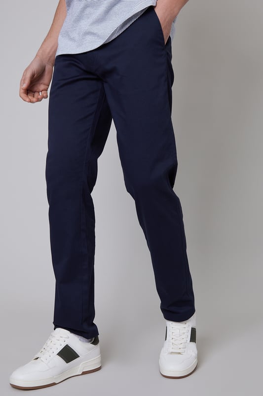 Elevate your everyday staples with this two pack of stretch chino trousers from Threadbare. Cut in a regular fit with two side pockets, these chino trousers have belt loops, a metal zip fly and mock horn button to close. Complete with two back welt pockets, two side pockets and a coin pocket. Made from a durable cotton twill fabric blended with elastane for a comfortable fit. Team with a T-shirt and open shirt for weekend style, or add a fine knit jumper for a practical workwear look.