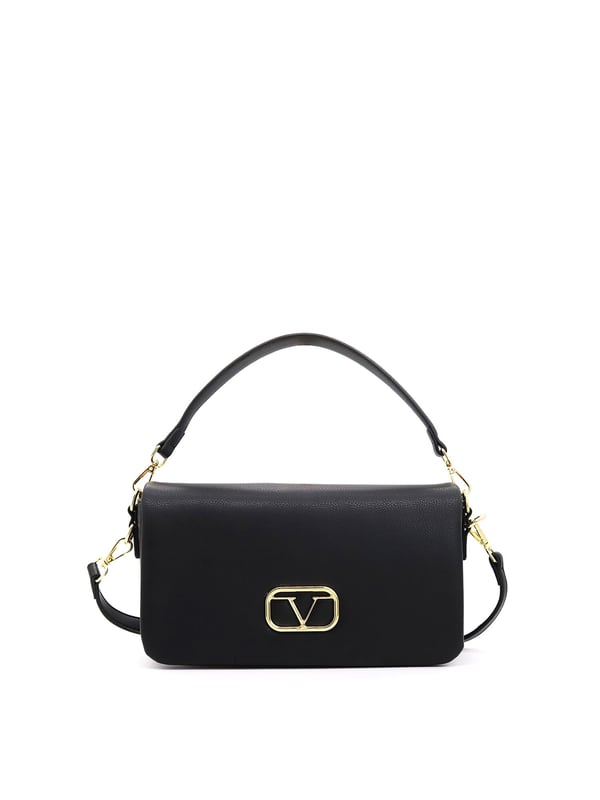 Bolso bandolera para mujer. El cierre es con botón magnético. Los bolsillos internos son uno con cremallera. Los bolsillos externos están ausentes. La bandolera es ajustable y extraíble en ecopiel. El asa es extraíble en ecopiel. Hay un compartimento interno. El material exterior es ecopiel. Internamente está forrado en poliéster. Medidas: 28x17x8 cm. Producto de moda