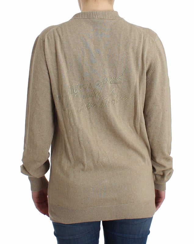 Brand new Ermanno Scervino beige cardigan with deep V-neck
  Made in Italy
  Material: 40% Rayon 25% nylon 25% wool 5% angora 5% cashmere
  Color: Beige
  Stylish logo details
Material: 8032990409619
