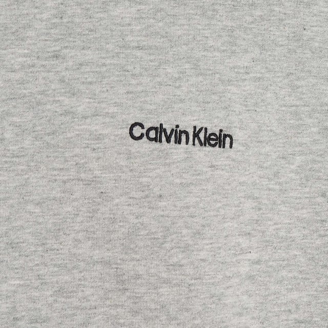 Mens Calvin Klein Lounge Sweatshirt in grey.- Ribbed crewneck.- Ribbed cuffs and hem.- Signature tape inside the neckline.- Calvin Klein embroidery on the chest.- Regular fit.- Ref: 000NM2300EP7A
