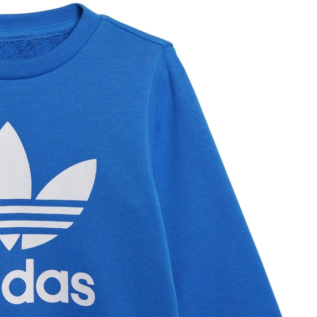 Dress them up in iconic sporty style. A big contrast Trefoil logo and 3-Stripes give this infants' outfit an authentic look. Both pieces are made of a cosy  soft French terry. Hidden shoulder snaps on the sweatshirt make it easy to slip on and off.Ribbed crewneckLong sleeves with ribbed cuffs; Ribbed pants cuffsRegular fit is not tight and not loose  the perfect in-between fit70% cotton  30% polyester (recycled)