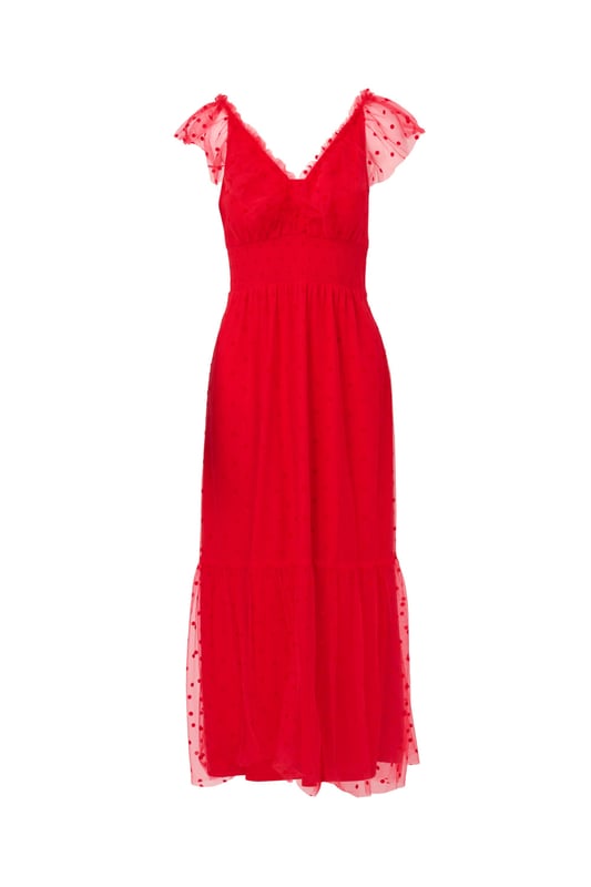 This is an ankle length soft skirt dress made out of a woven tulle fabric, with a v-neck neckline in the front, v-neck neckline in the back, sleeveless, tulle with flocked dot, a flounce hem, smocking, ruffle, shirring, tie detail at the back, and zipper at the centre back.