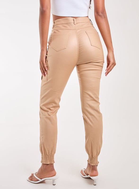 Featuring a PU material and buckle detailing. Team our Cuffed Cargo Trousers with your existing wardrobe pieces for a blogger-worthy look.