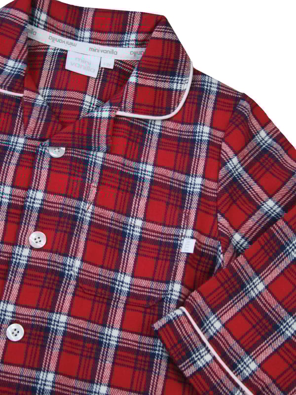 Explore our classic Boy's Red Check Traditional Pyjamas. These timeless and comfortable pyjamas set are perfect for a cosy night's sleep. Our pyjamas feature soft fabrics and stylish designs. Shop now for the perfect sleepwear for your little one