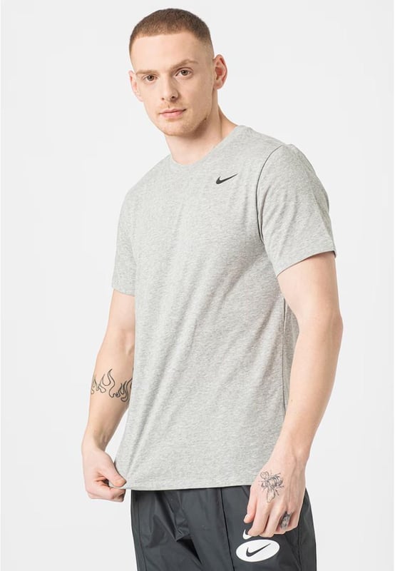 Nike Training Dri-FIT T-shirt in Grey The Nike Dri-FIT Men's Training T-Shirt is a super soft and comfortable t-shirt to wear while running or lifting weights. - -. This Nike men's t-shirt features Dri-FIT technology to wick away sweat leaving you feeling dry. - -. Plus, the training shirt's standard-fit offers a great range of motion, so you stay comfortable throughout each rep. - -. Make sure you're ready for your next workout with the Nike Dri-FIT Men's Training T-Shirt.