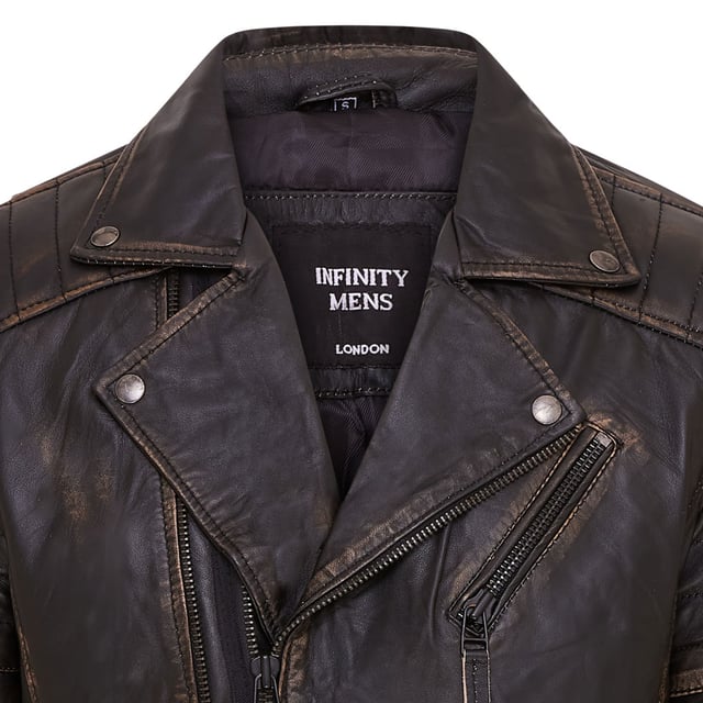 The centrepiece of a timeless look, this jacket is crafted with full grain nappa leather to achieve a slim fit stylish biker silhouette. Eye catching additions to this piece include ribbed detailing on the shoulders and a traditional wide collar. The front of the jacket is accented with a double zip and features a slanted zip pocket across the breast as well as a further two zip pockets. This jacket comes in a range of colours to suit a variety of tastes, allowing all to find their ideal style in this classic Brando style piece.

• 100% premium ultra-soft nappa leather.
• Slanted zip breast pocket • Double zip front, tagged for ease of use
• Wide notch stud fastened lapels
• Pockets integrated into the jacket lining
• Ribbed detailing on the shoulders
• Stylish zipped cuffs