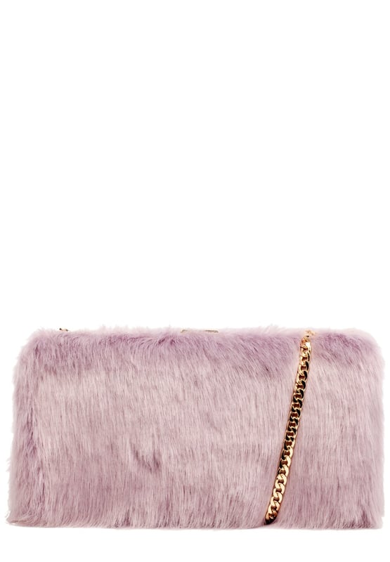 A girls wardrobe is never too full of fabulous bags! Set the trend this season with this funky and tactile faux fur Pandora clutch bag- the must have statement look. Inside is lined with fuchsia twill lining and the handy slip pocket- perfs for your party night essentials! It comes with a fierce detachable gold chain shoulder strap so you can switch up the style to suit whatever outfit you are slayin. Features: , Tactile faux fur exterior, Metal frame and clasp, Detachable chain shoulder strap, Fuschia twill lining, Inner slip pocket Style Ref: 81853 LILAC