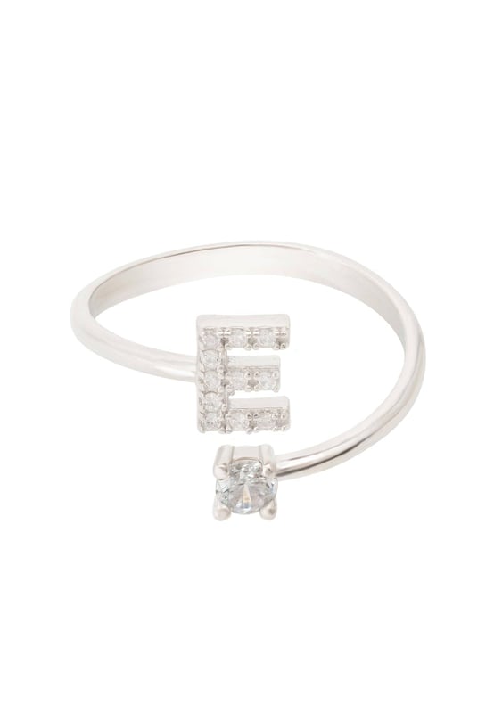 Design:This simple but beautifully styled initial letter ring is perfect for those who covet delicate jewellery with a hint of sparkle offering a sophisticated finishing touch to any outfit.Pretty and petite, this initial ring features an open band, which allows for slight adjustability with sizing. The opening is designed to be on top of your finger, where your zircon adorned monogram is on one side and a single larger cubic zirconia resides on the other.What can be more personal than a name? Give this initial ring as the perfect personalised birthday gift.This ring is made as an average size 6 (M) with a small amount of flexibility, that can easily be squeezed or opened very gently, to allow for a better fit.This ring looks great stacked with other rings.  Materials:Handcrafted using 925 sterling silver. White cubic zirconia.Style Notes:Personalised birthday gift ideas. Bridesmaid gifts. Simple everyday styling.Dimensions:One size only (average size 6 (M) with slight flexibility)Packaging:This item is presented in a Latelita London signature jewellery box.Care Instructions:To maintain your jewellery, wipe gently with a damp cloth that is soft and clean. Do not soak in water. Avoid contact with soaps, detergents, perfume or hair spray.