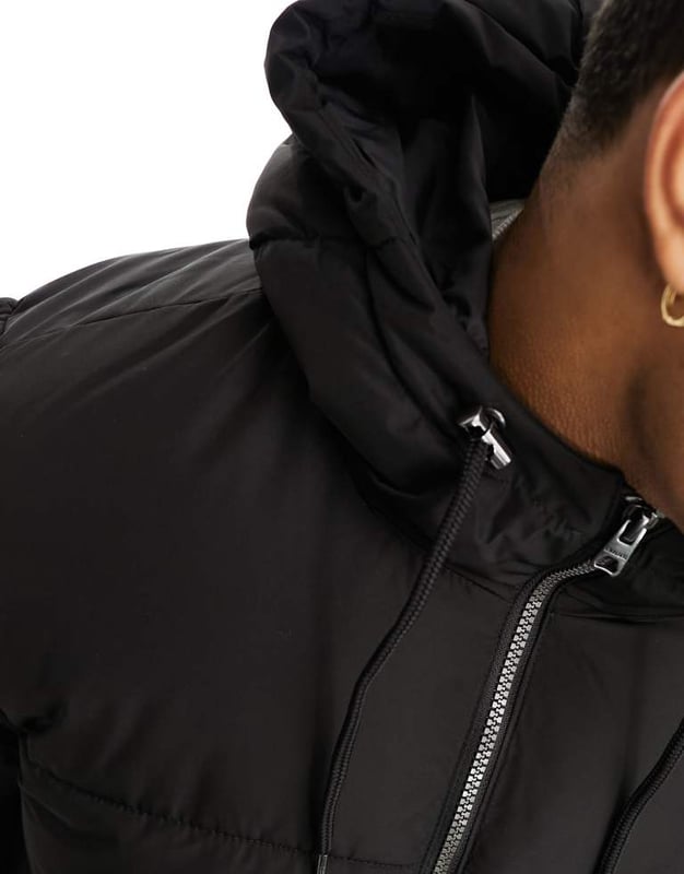 ONLY & SONS longline hood puffer jacket in black Jackets & Coats by Only & Sons Head-to-toe warmth Toggle hood Zip fastening Side pockets Longline cut Regular fitSold By: Asos