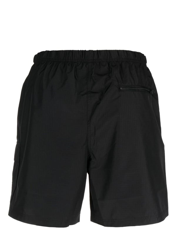 Off-White subtly adds its signature Industrial strap in these swim shorts, detailing the pair with an unconventional belted waist.
